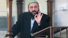Arabic-speaking cleric claims to have been sacked for hoping to learn English